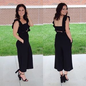 Cropped Black Ruffle Suspender Jumpsuit